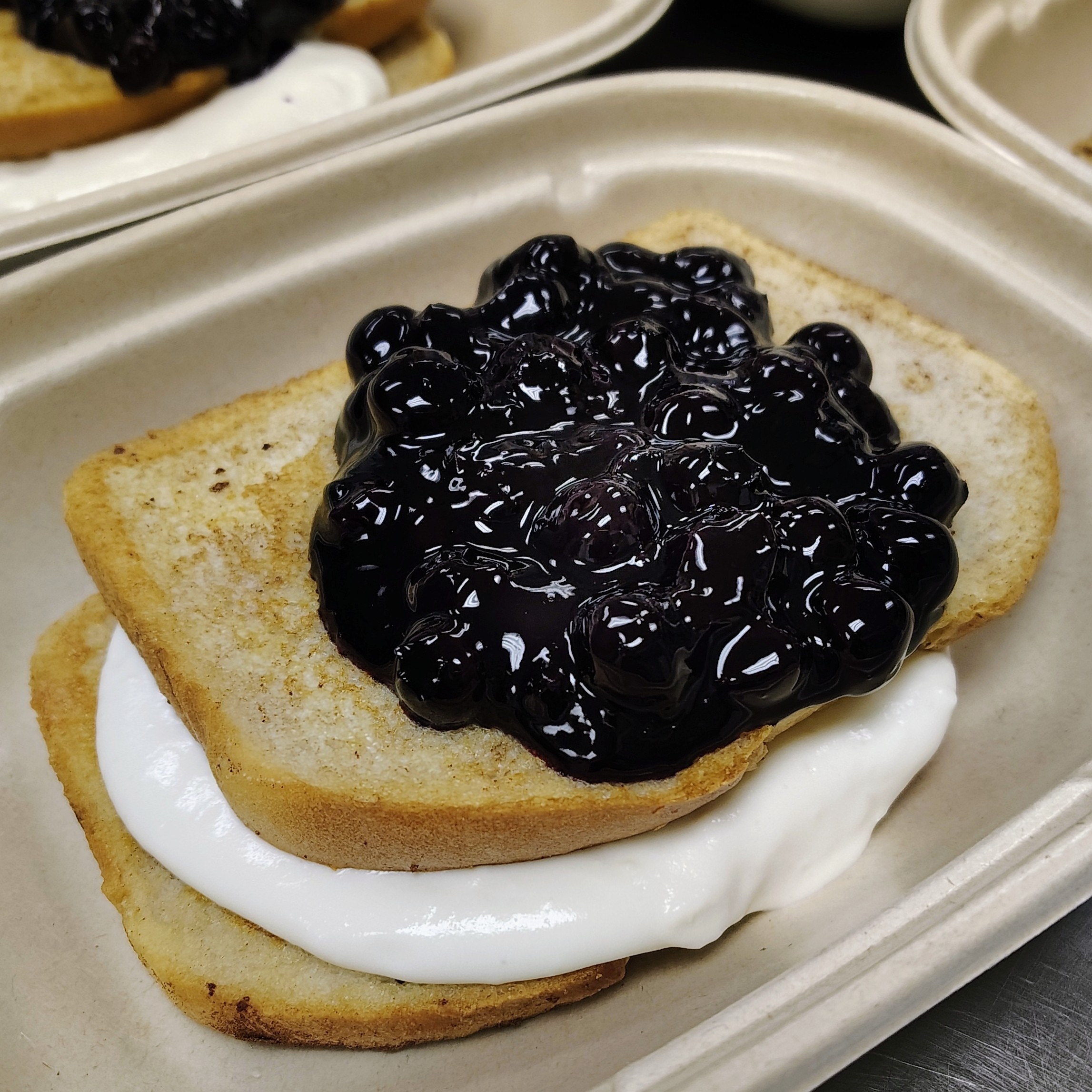 Vanilla Protein Stuffed French Toast with Blueberry Compote
